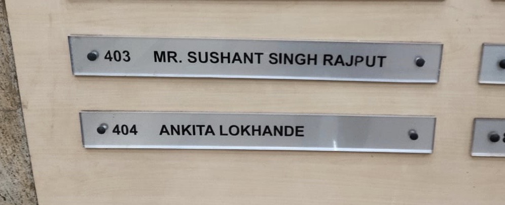 Name plates of Sushant Singh Rajput and Ankita Lokhande at Malad building