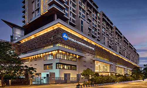 In a landmark ruling, the Bombay High Court has directed MMRDA to return nearly ₹647 crore to Reliance Industries, holding that demands for delay penalty on the BKC Convention & Exhibition Centre project were arbitrary and illegal. The court cited the composite nature of the project, court stay, statutory delays and discriminatory policy on construction timelines.